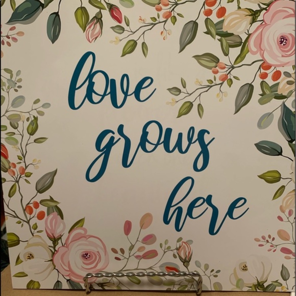 “love grow here” print